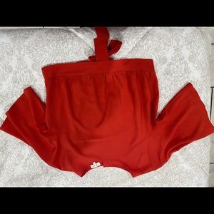 Red basic top with buttons and tie on the back